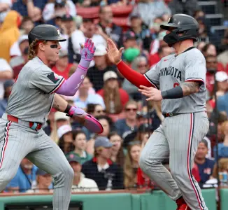 Twins storm back late in game to win series in Boston