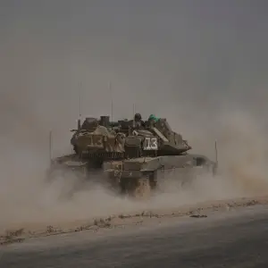 Amid Cease-Fire Talks, Israel Expands Ground Operations in Gaza